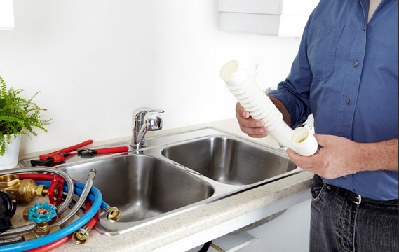 on of our pros is working on a plumbing job in Hialeah