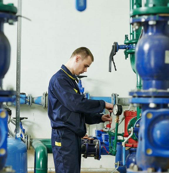 our tech is working on a commercial plumbing job