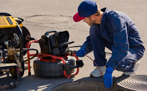 our dedicated tech is working on a sewer repair using a sewer video camera