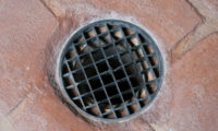 preventing odors from floor drains in commercial kitchens