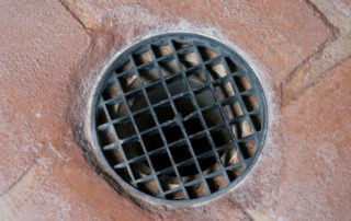 preventing odors from floor drains in commercial kitchens