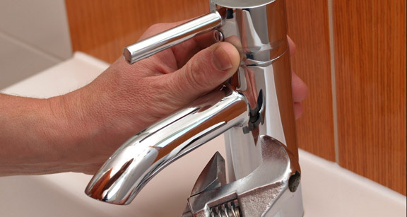 Matt, one of our techs is repairing a bathroom leaky faucet