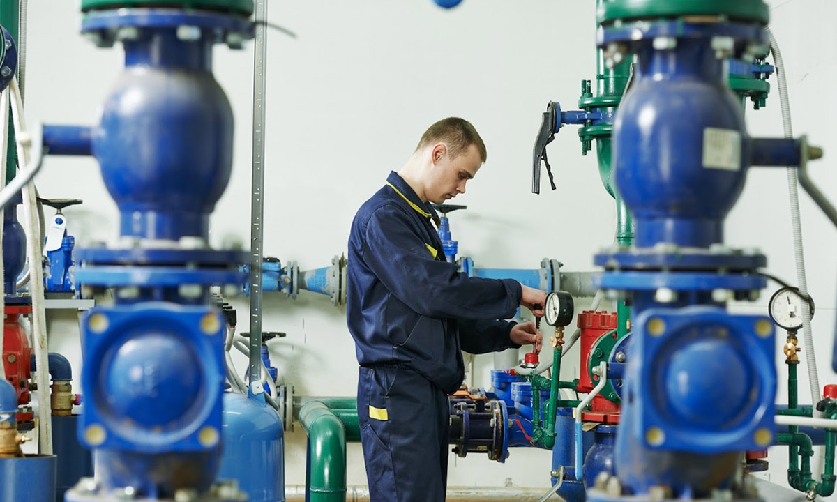 plumber doing an annual maintenance check